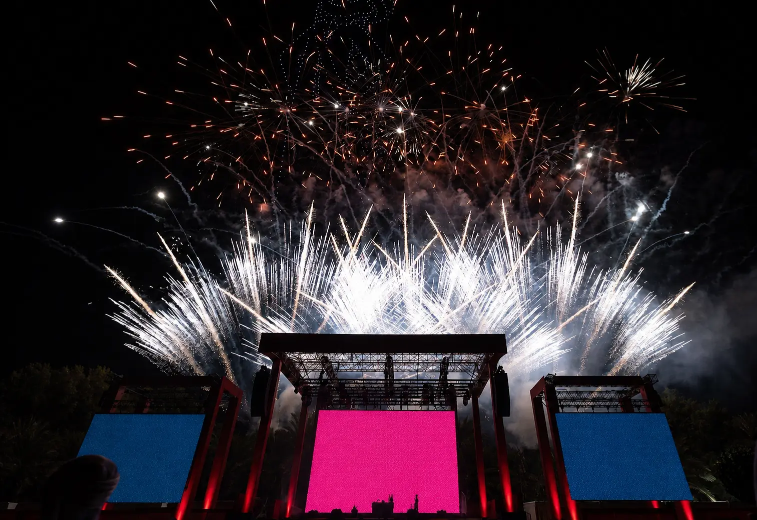 Fireworks above a festival stage